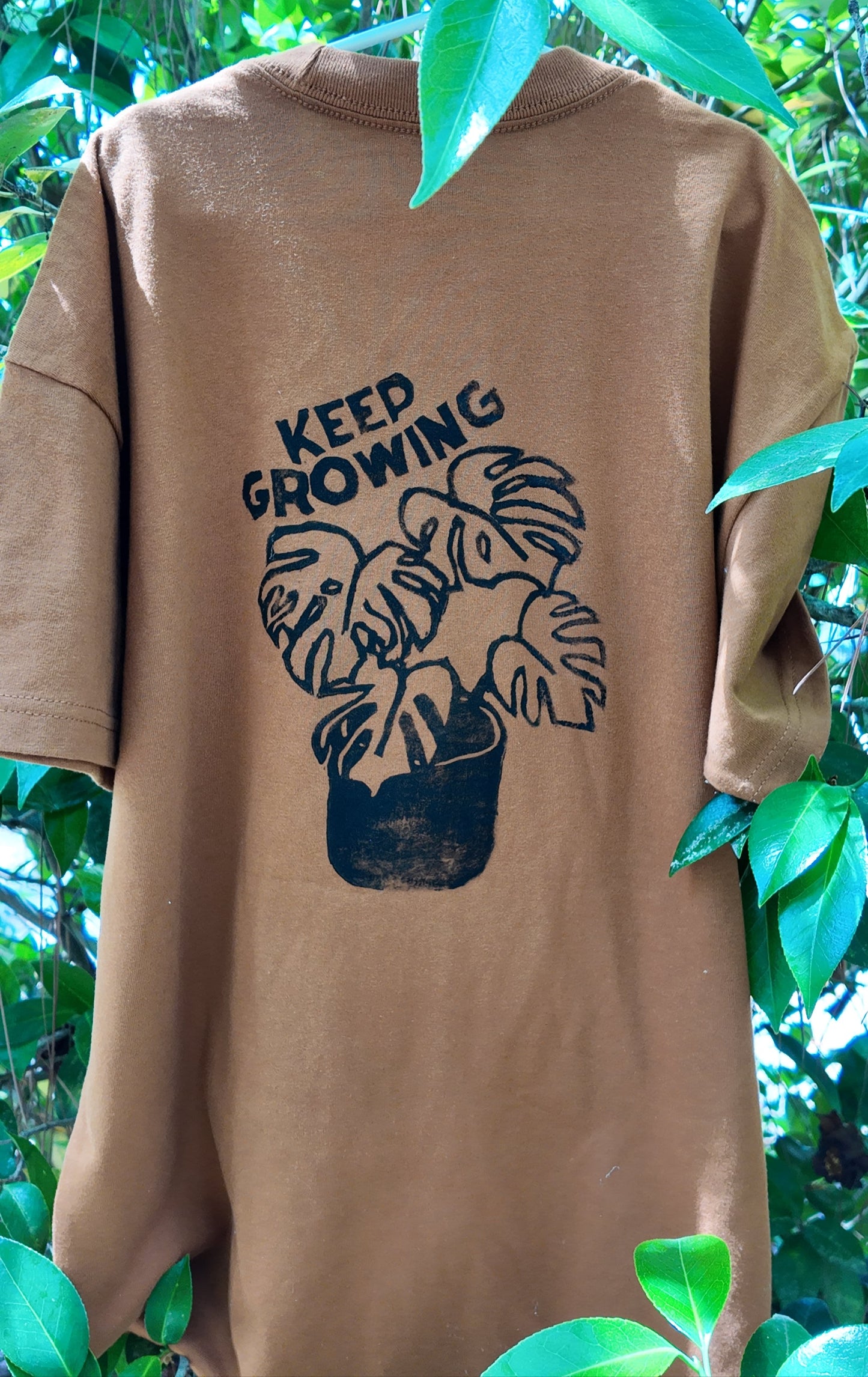 MADE TO ORDER 2-3WK TURNAROUND | Burnt Orange 'Keep Growing' Monstera Block Printed Baggy T-Shirt | Oversized | Hand-Inked | XS-3XL | Soft and Sensory Friendly | UNISEX |